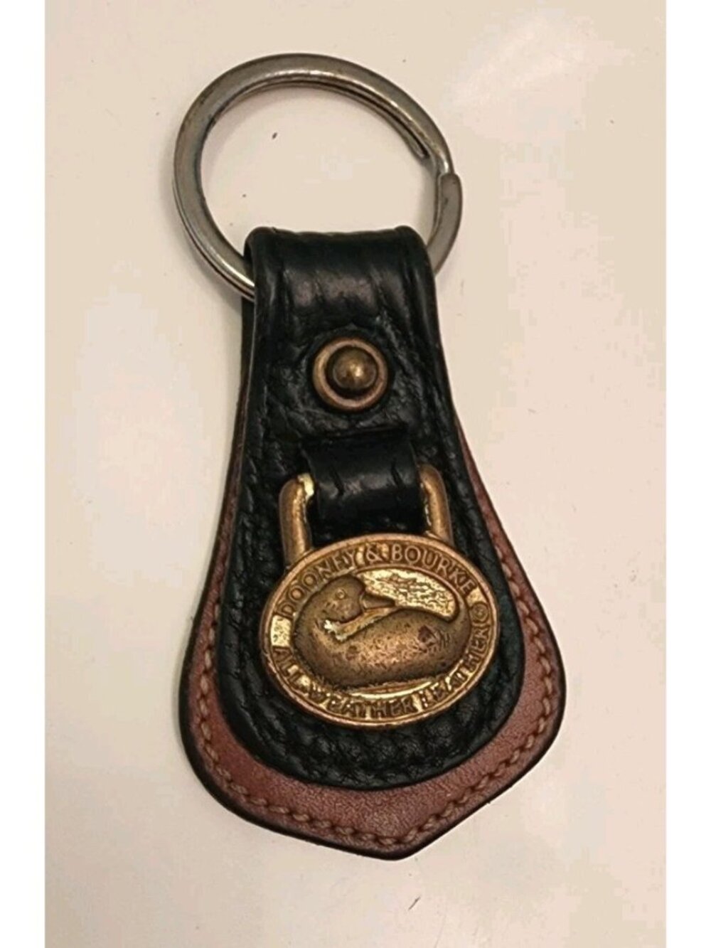 Dooney & Bourke Black All Weather Pebble Leather Key Ring Fob Vintage Brass Logo